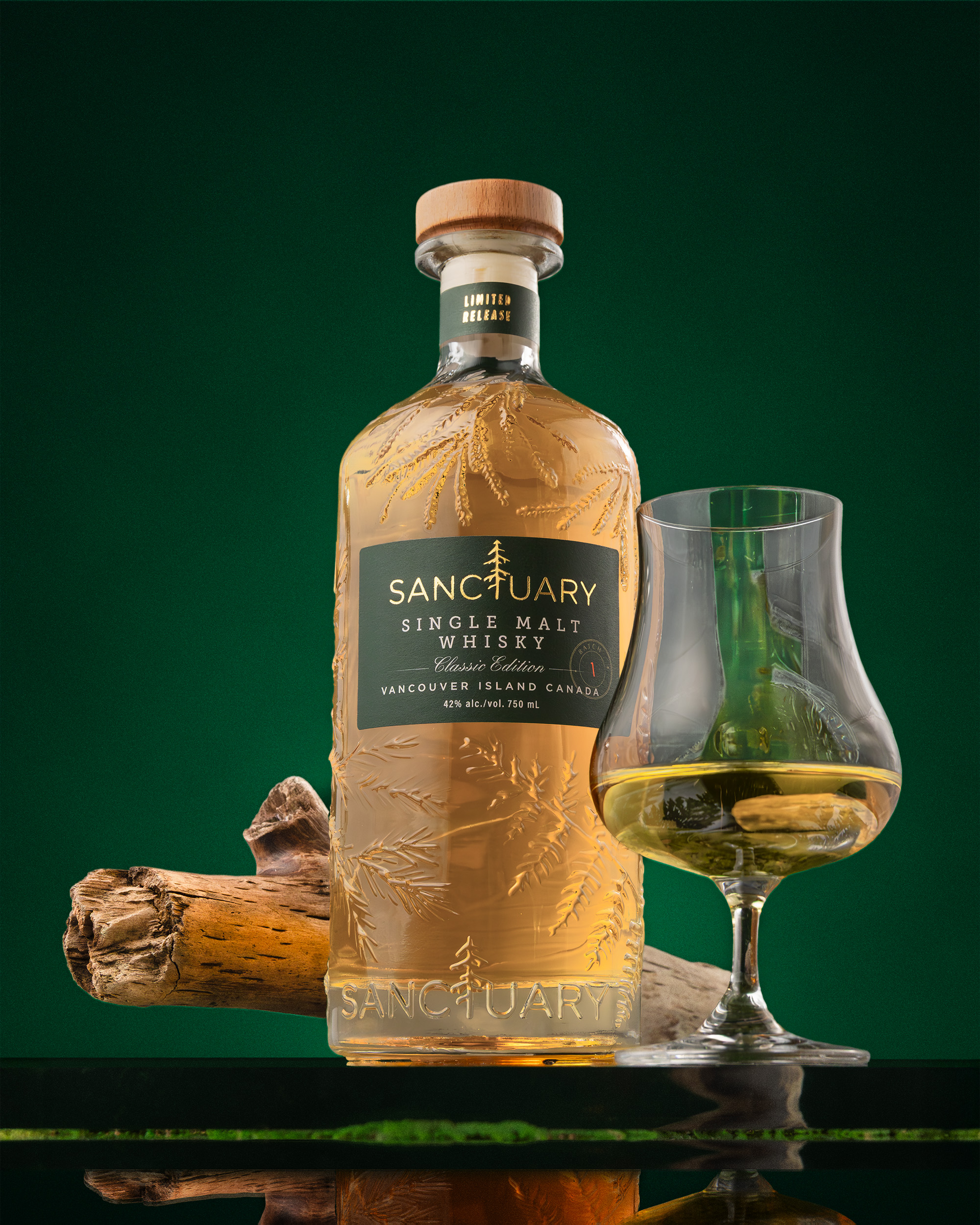 Sanctuary Classic Edition bottle with Glencairn of whisky and cedar driftwood
